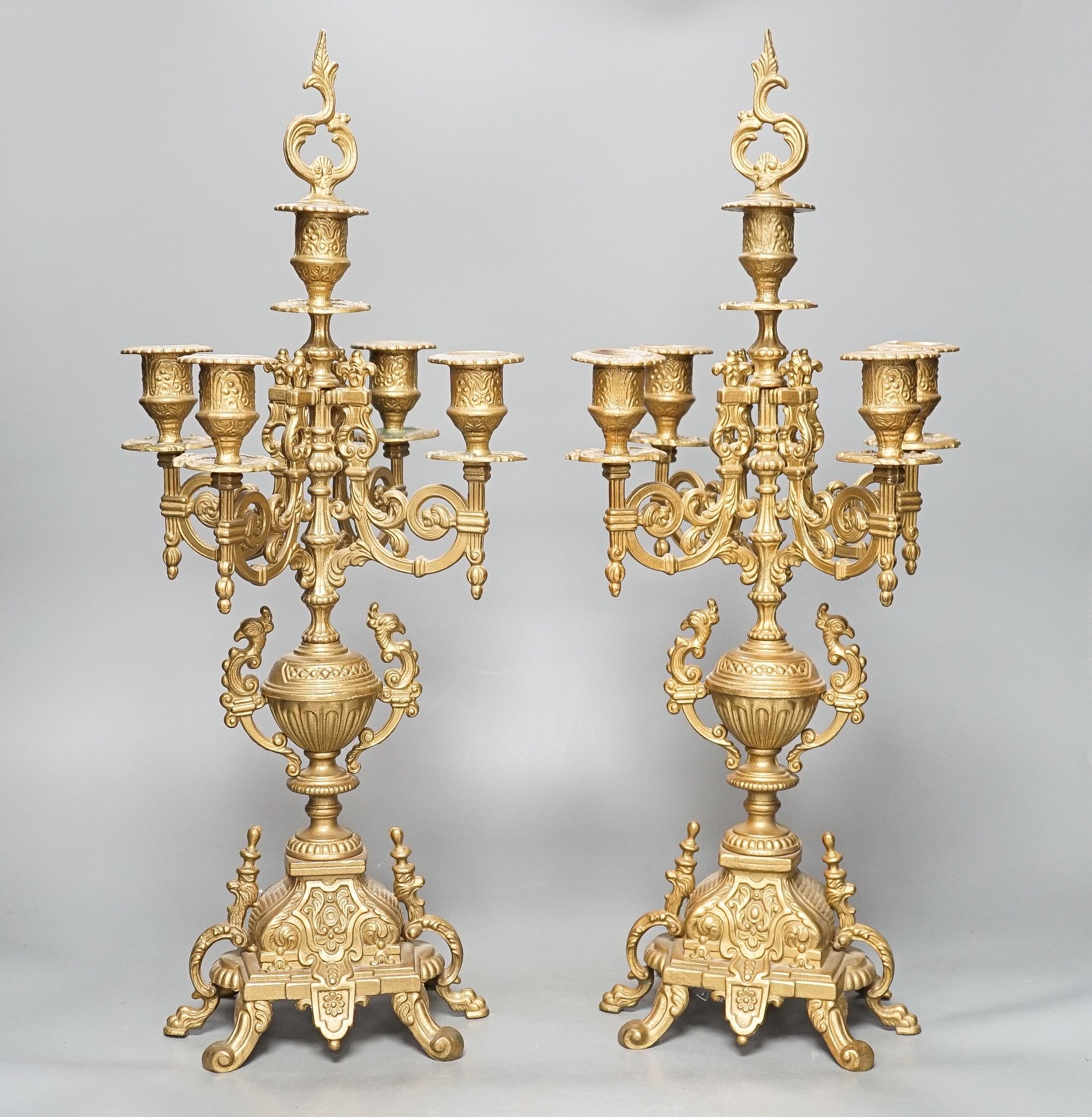 A large pair of ornate baroque style gilt-brass candelabra, 51cm